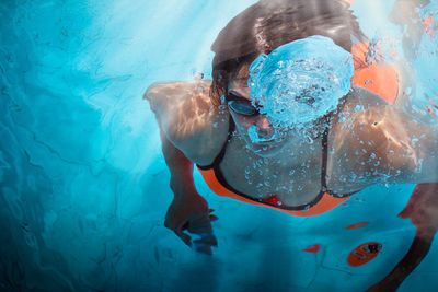 Woman swimming in pool