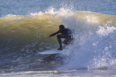 Man surfing in sea