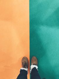 Low section of man standing on floor