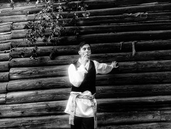 Portrait of woman standing outdoors