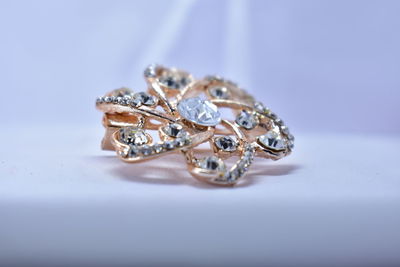 Close-up of wedding rings on table