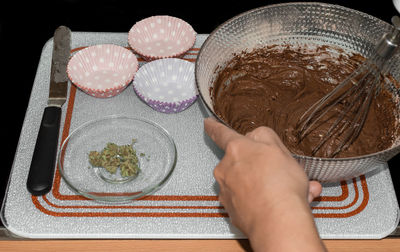 High angle view of person preparing food on table