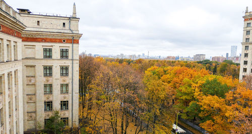 Autumn in moscow university, aerial view of golden campus among stalin epoch buildings