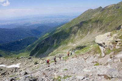 High angle view of hikers hiking at negoiu peak