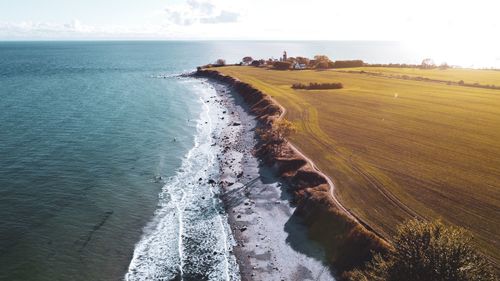 Scenic drone view of sea against sky