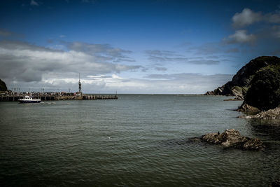 Scenic view of bay against sky