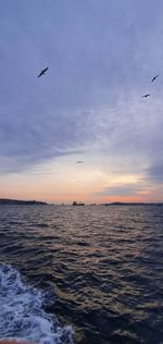 Scenic view of sea against sky during sunset