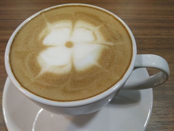 Close-up of cappuccino on table