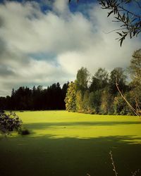 View of golf course against sky