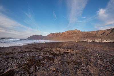 Scenic view of beach against sky