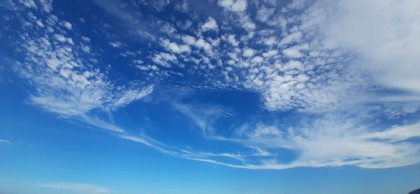 Low angle view of clouds in blue sky