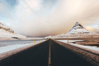 Snow covered mountain against sky