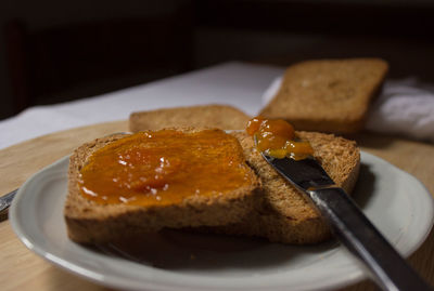 Close-up of breakfast served on table