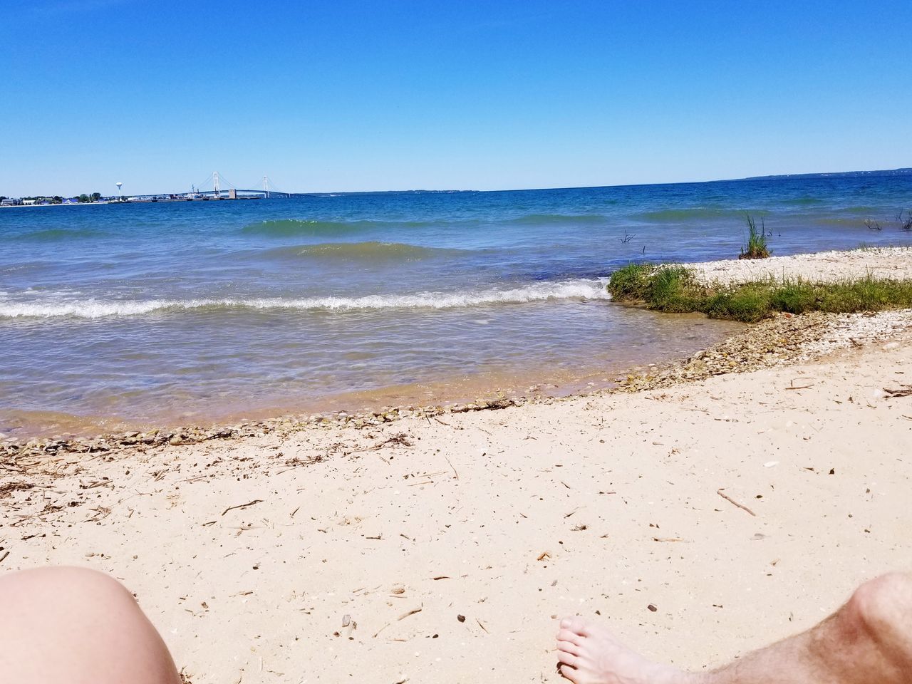 LOW SECTION OF PERSON ON BEACH