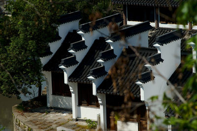 Exterior of traditional building by trees