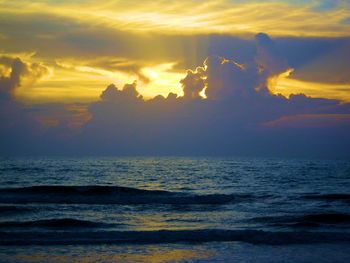 Scenic view of sea at sunset