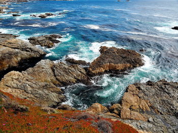 High angle view of rocky sea shore