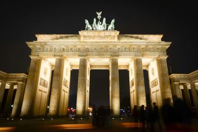 Low angle view of brandenburg gate at night