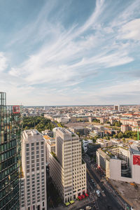 High angle view of buildings in city against sky