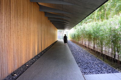 Modern japanese architecture with leading lines and one person in the background