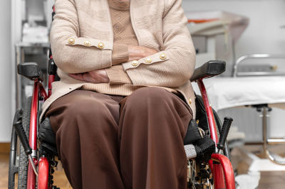 Portrait of young woman sitting in car