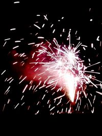 Firework display at night