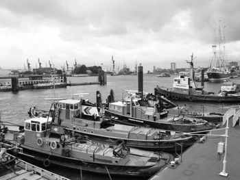 High angle view of boats moored at harbor