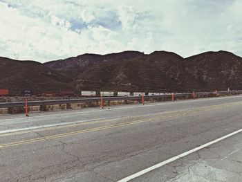 Road with mountains in background