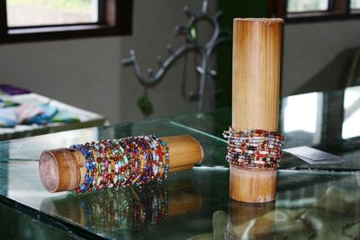 Close-up of bracelets on table