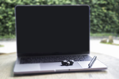 Close-up of laptop on table