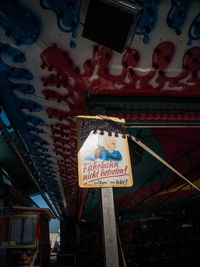 Low angle view of information sign