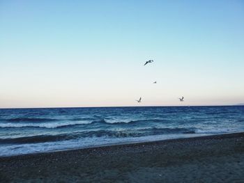 Scenic view of sea against clear sky