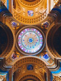 Low angle view of illuminated ceiling of building