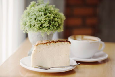 Close-up of coffee cup on table