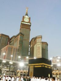 Tourists in front of building