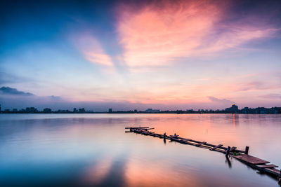 Scenic view of sea against sky during sunset