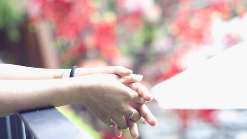 Close-up of woman hand on blurred background