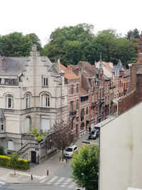 Buildings in city against sky