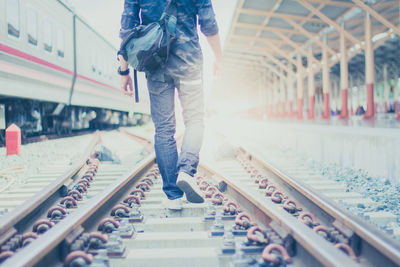 The man walking on railway