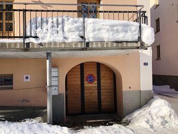 Snow covered entrance of building