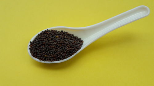 Close-up of bread on yellow background