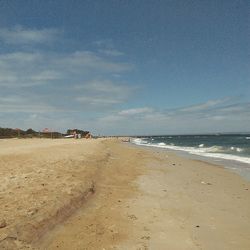 Scenic view of beach against sky