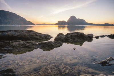 Scenic view of sea against sky during sunset