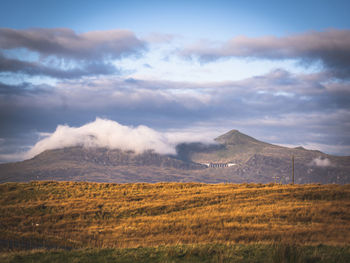 Scenic view of field against sky of blaenau-ffestiniog in wales