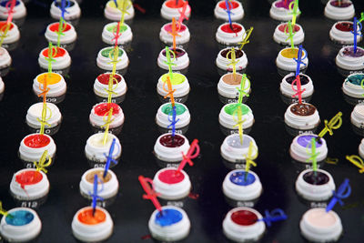 High angle view of multi colored candles
