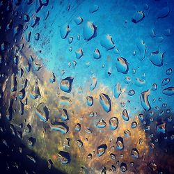 Close-up of water drops on glass