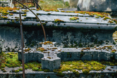 Stone cross in cemetery