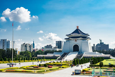 View of buildings in city against sky