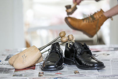 Person polishing shoes