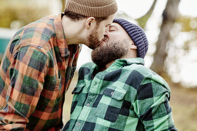 Homosexual couple kissing